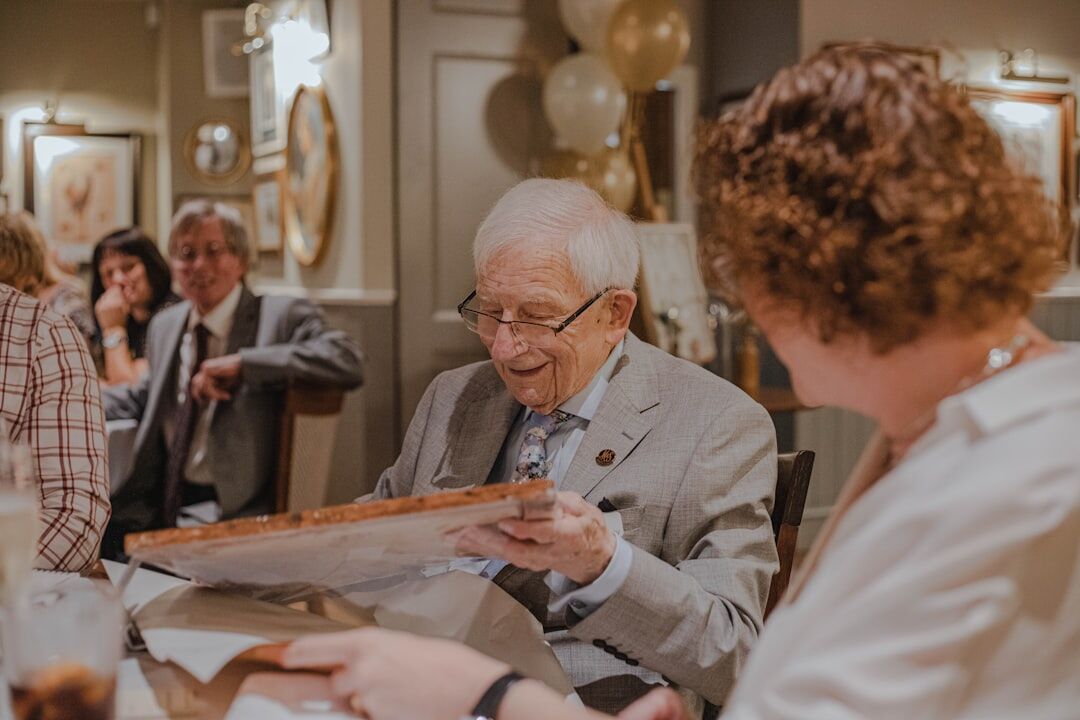 seniors enjoying meal together