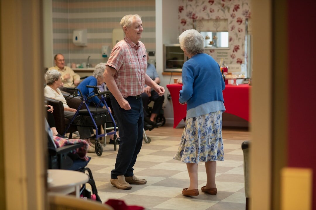 Senior couples dancing together at a social evening