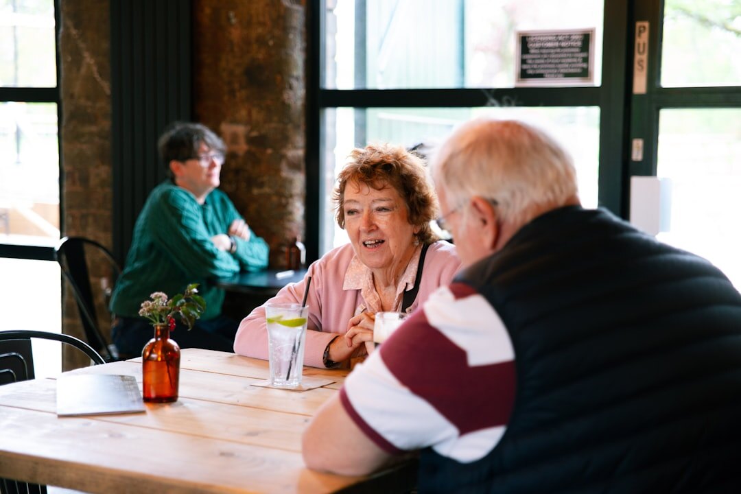 elderly people chatting in group