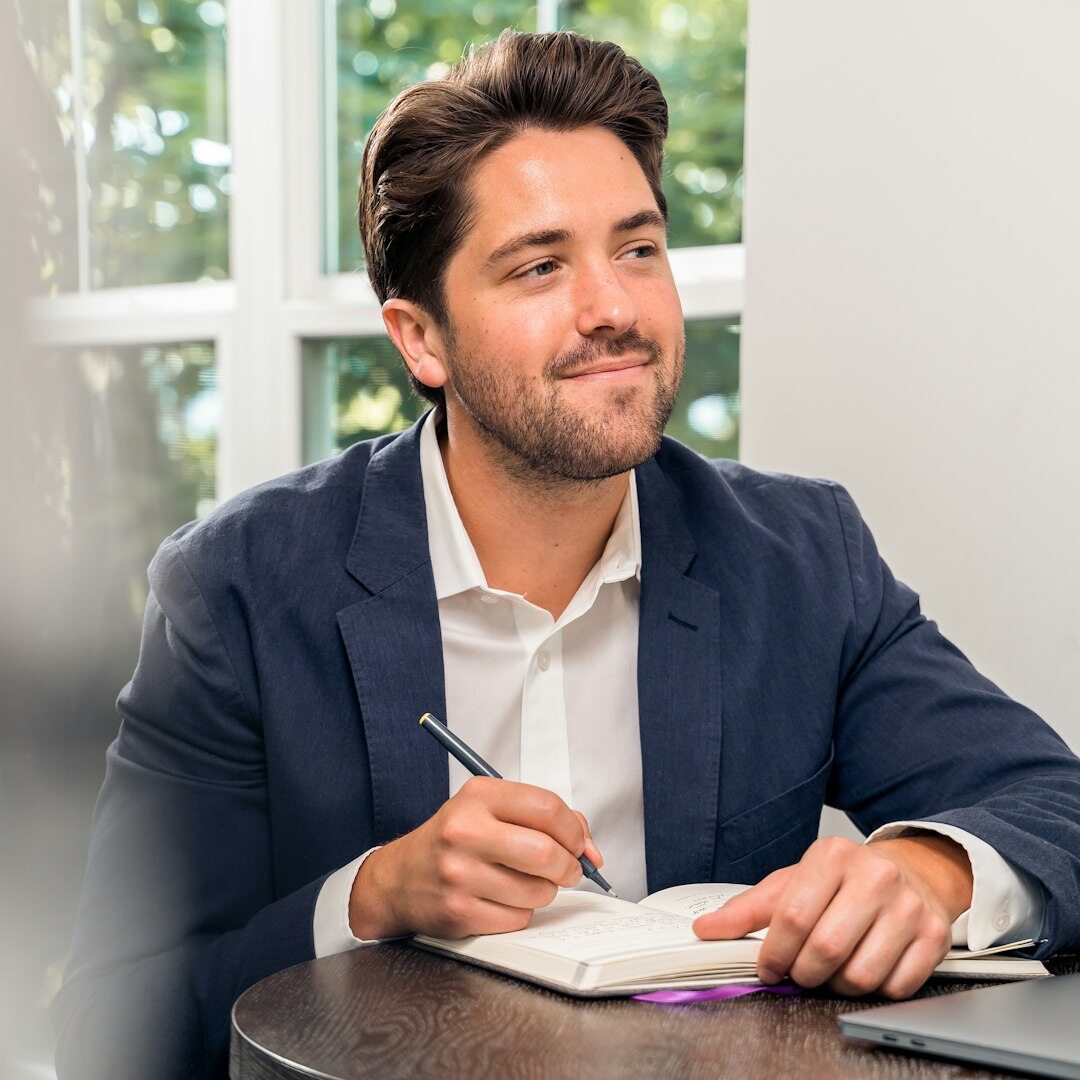Portrait of a friendly man events coordinator