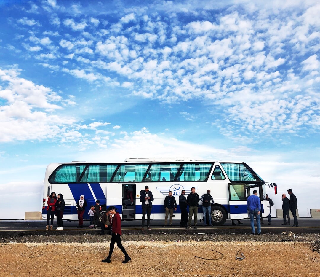 Seniors boarding a tour bus for a group excursion