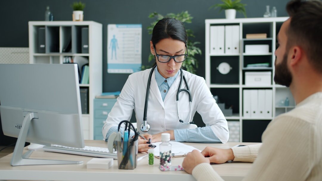doctor consulting senior patient